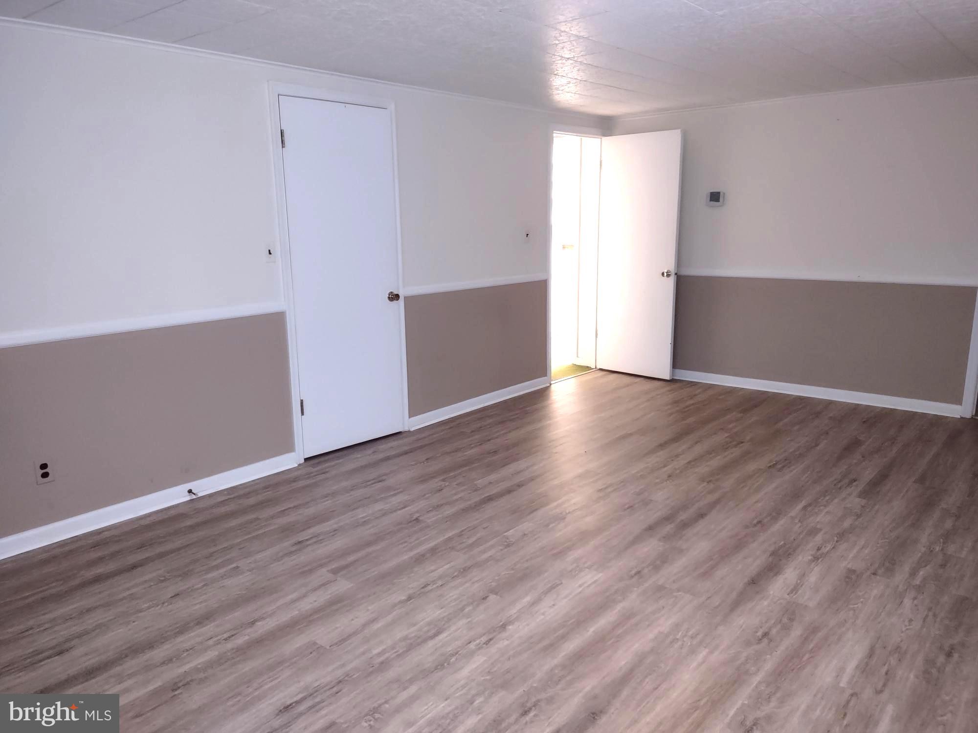 4103 Kincaid Road Baldwin, MD 21013 - Photo 66 of 73 a view of wooden floor and windows in a room