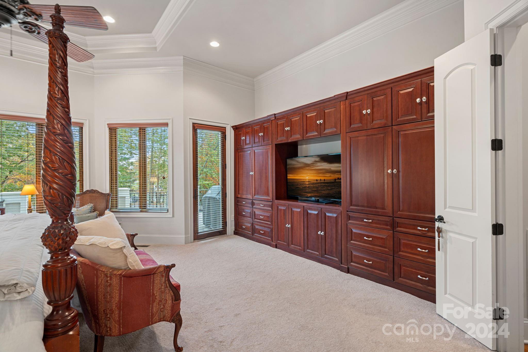 2017 Brawley School Road Mooresville, NC 28117 - Photo 17 of 43 a living room with furniture and a flat screen tv