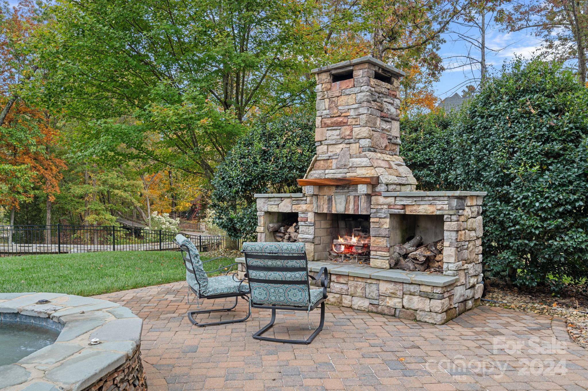 2017 Brawley School Road Mooresville, NC 28117 - Photo 33 of 43 a view of house with outdoor space and sitting area