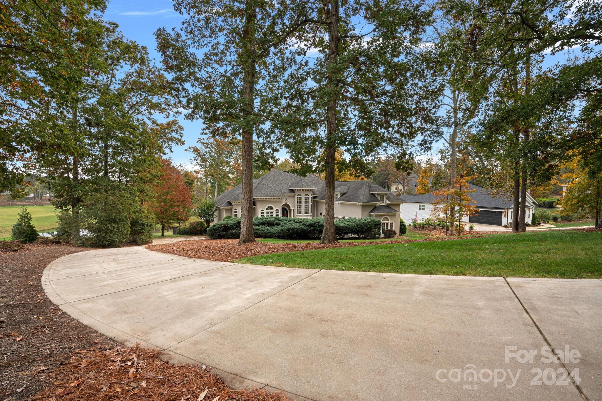 2017 Brawley School Road Mooresville, NC 28117 - Photo 43 of 43 a view of outdoor space with yard and trees in the background