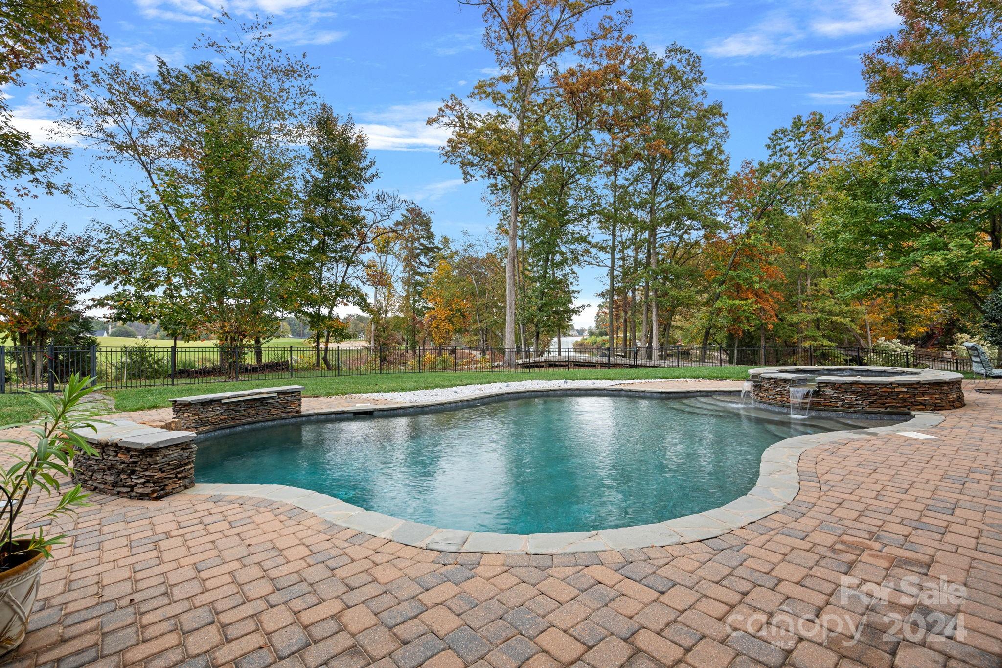 2017 Brawley School Road Mooresville, NC 28117 - Photo 6 of 43 a view of a swimming pool with a yard