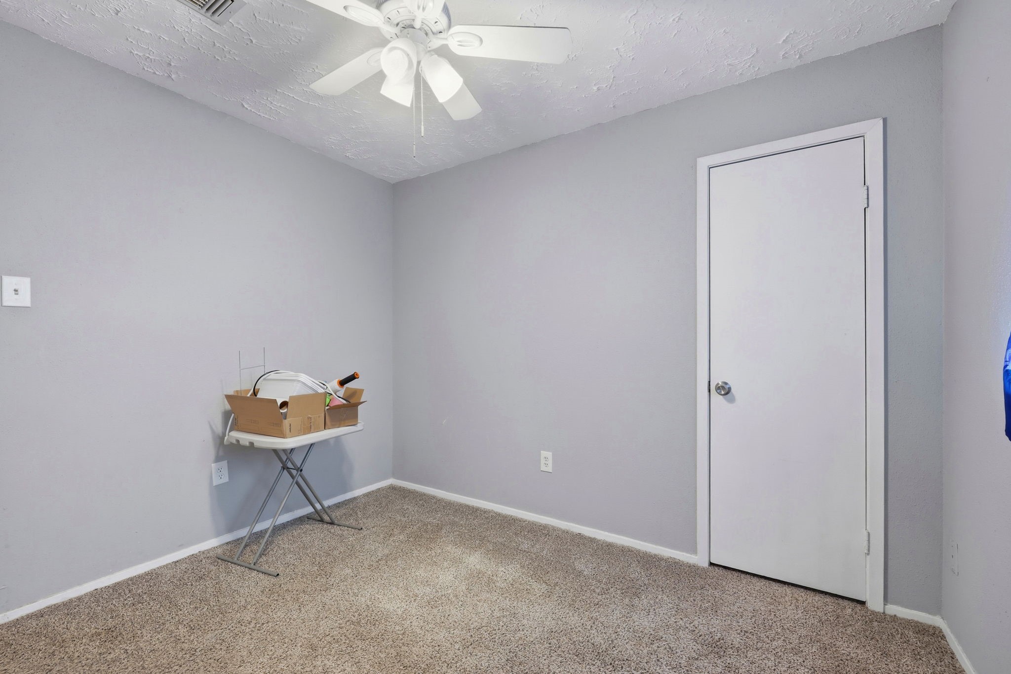 5421 Diane Court Spring, TX 77373 - Photo 23 of 24 an empty room with a mirror and a fan
