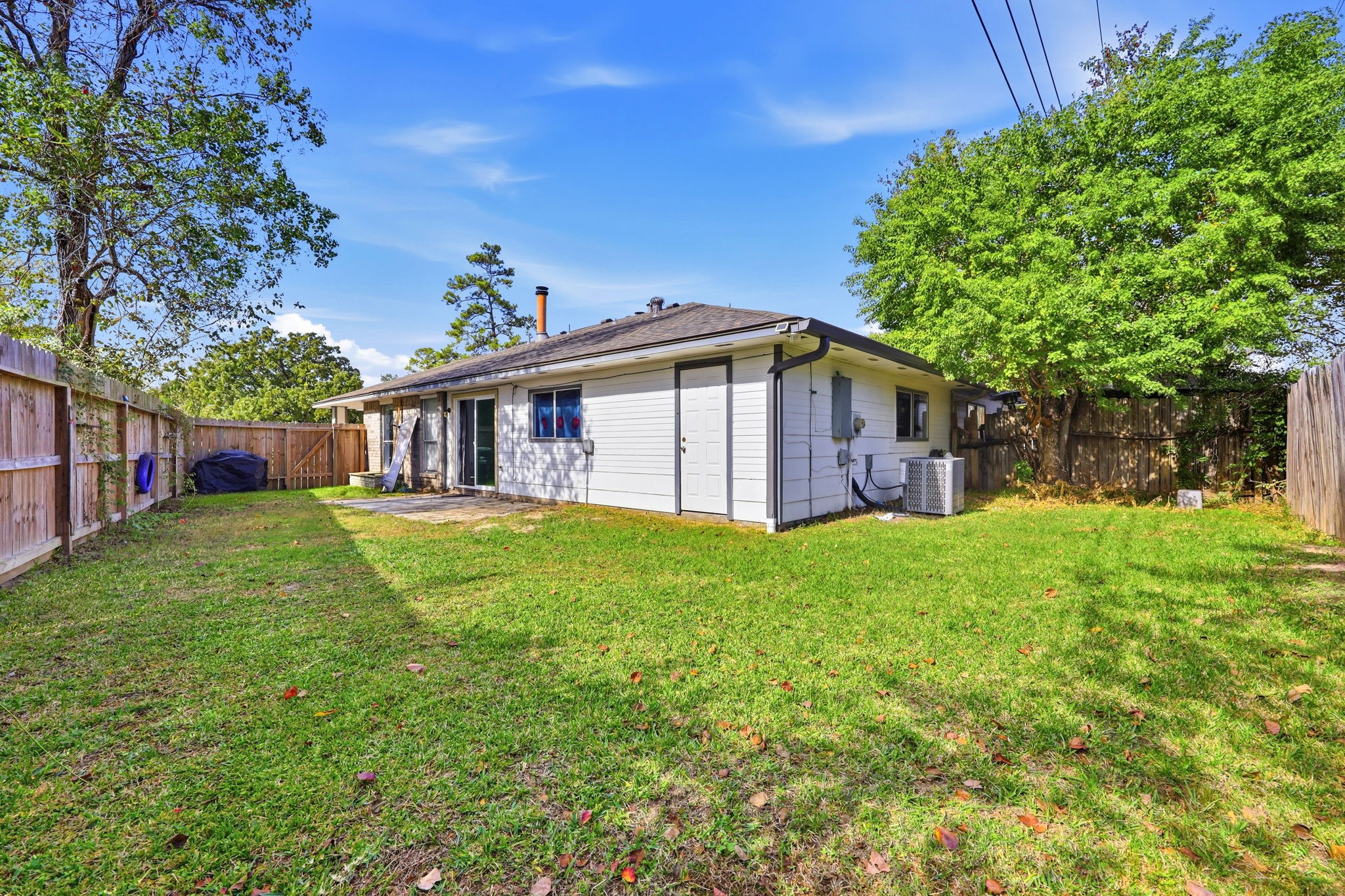 5421 Diane Court Spring, TX 77373 - Photo 6 of 24 a front view of a house with yard and green space