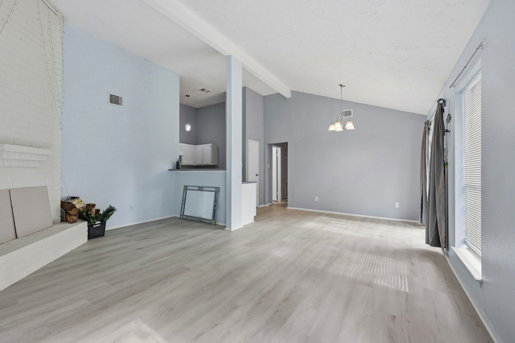 5421 Diane Court Spring, TX 77373 - Photo 9 of 24 a view of a big room with wooden floor and furniture