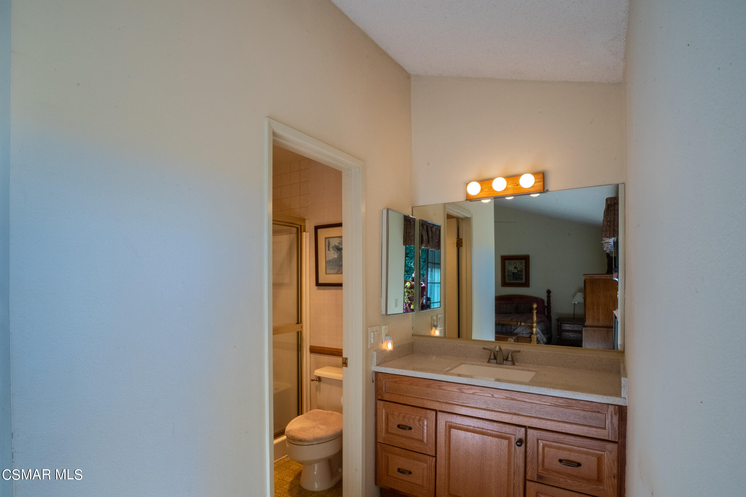 1932 Summer Cloud Drive Thousand Oaks, CA 91362 - Photo 13 of 23 a bathroom with a sink and a mirror