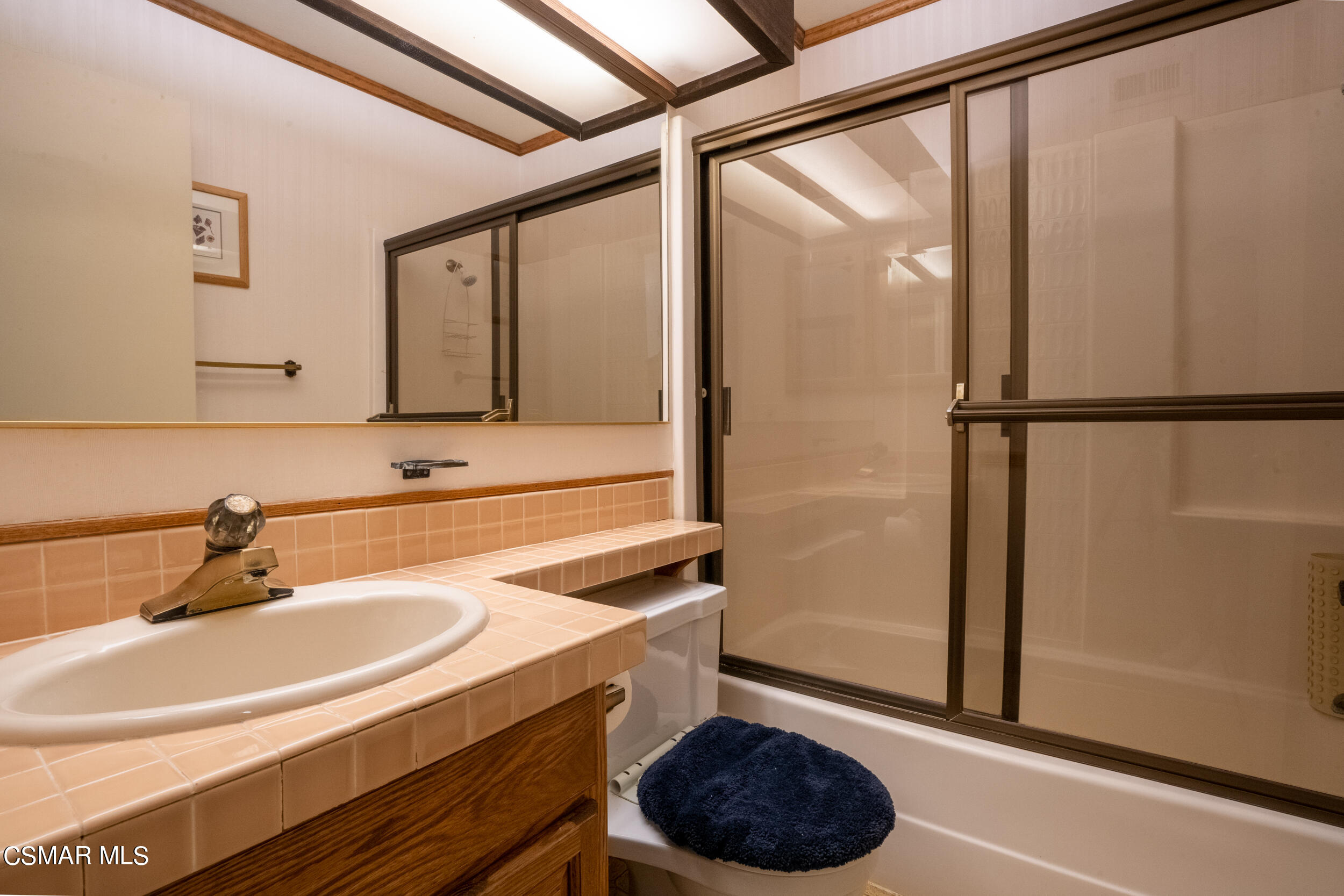 1932 Summer Cloud Drive Thousand Oaks, CA 91362 - Photo 16 of 23 a bathroom with a sink and a mirror