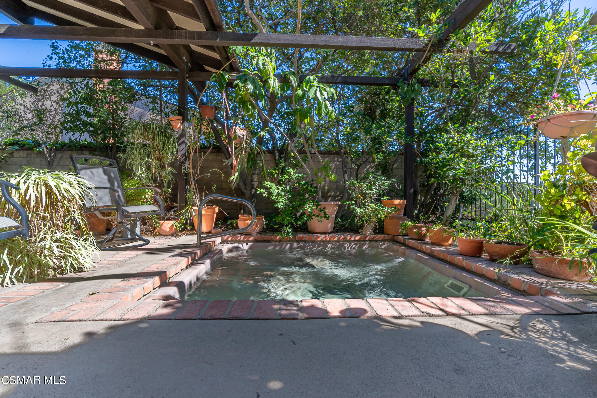 1932 Summer Cloud Drive Thousand Oaks, CA 91362 - Photo 20 of 23 a view of a backyard with a sitting area