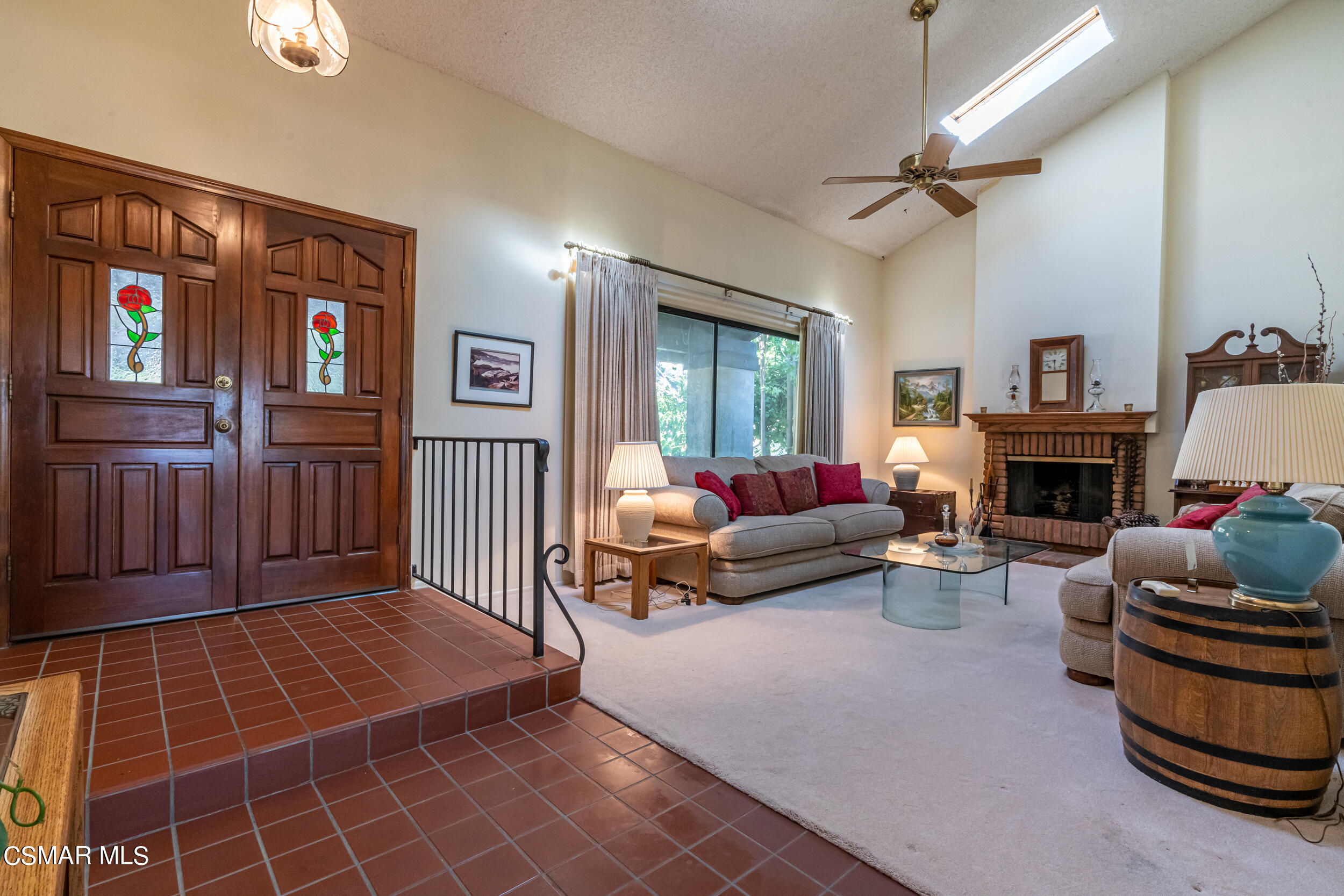 1932 Summer Cloud Drive Thousand Oaks, CA 91362 - Photo 3 of 23 a living room with furniture a window and a fireplace