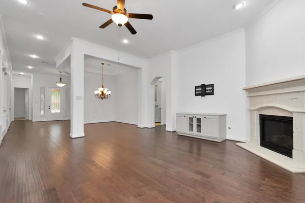 a view of kitchen with cabinets appliances and wooden floor