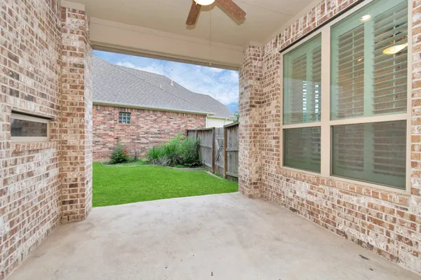 a view of a porch with a backyard