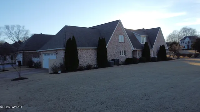 a view of a house with a garage