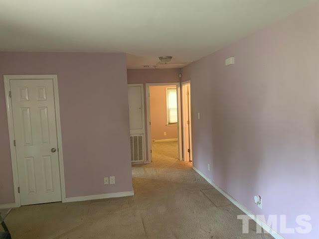 408 Lansing Street Raleigh, NC 27610 - Photo 9 of 11 a view of an empty room and window