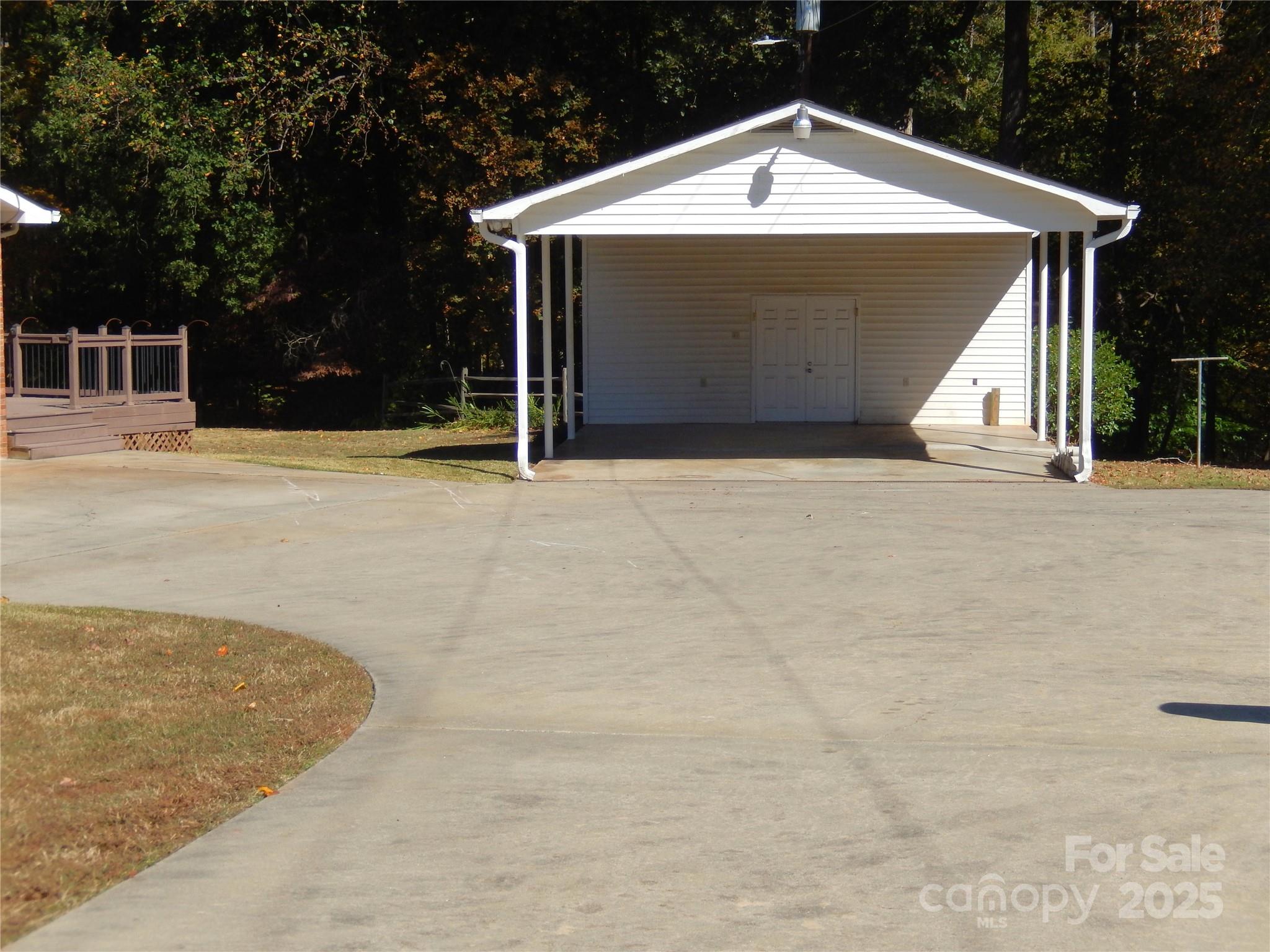 11002 Harrisburg Road Fort Mill, SC 29707 - Photo 8 of 45 a front view of a house with a yard and garage