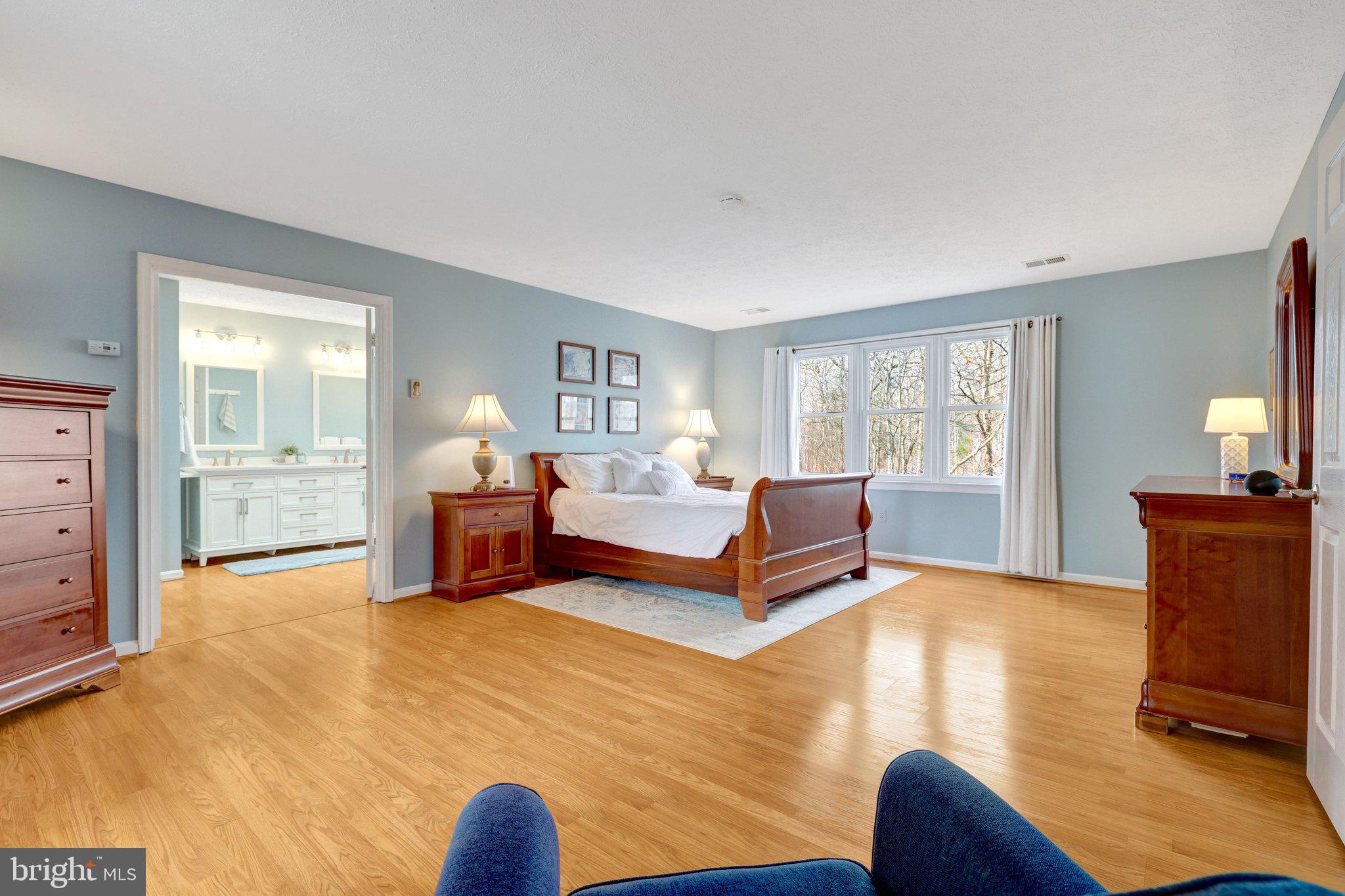 34 Lipscomb Court Sterling, VA 20165 - Photo 39 of 91 a bedroom with furniture and a window