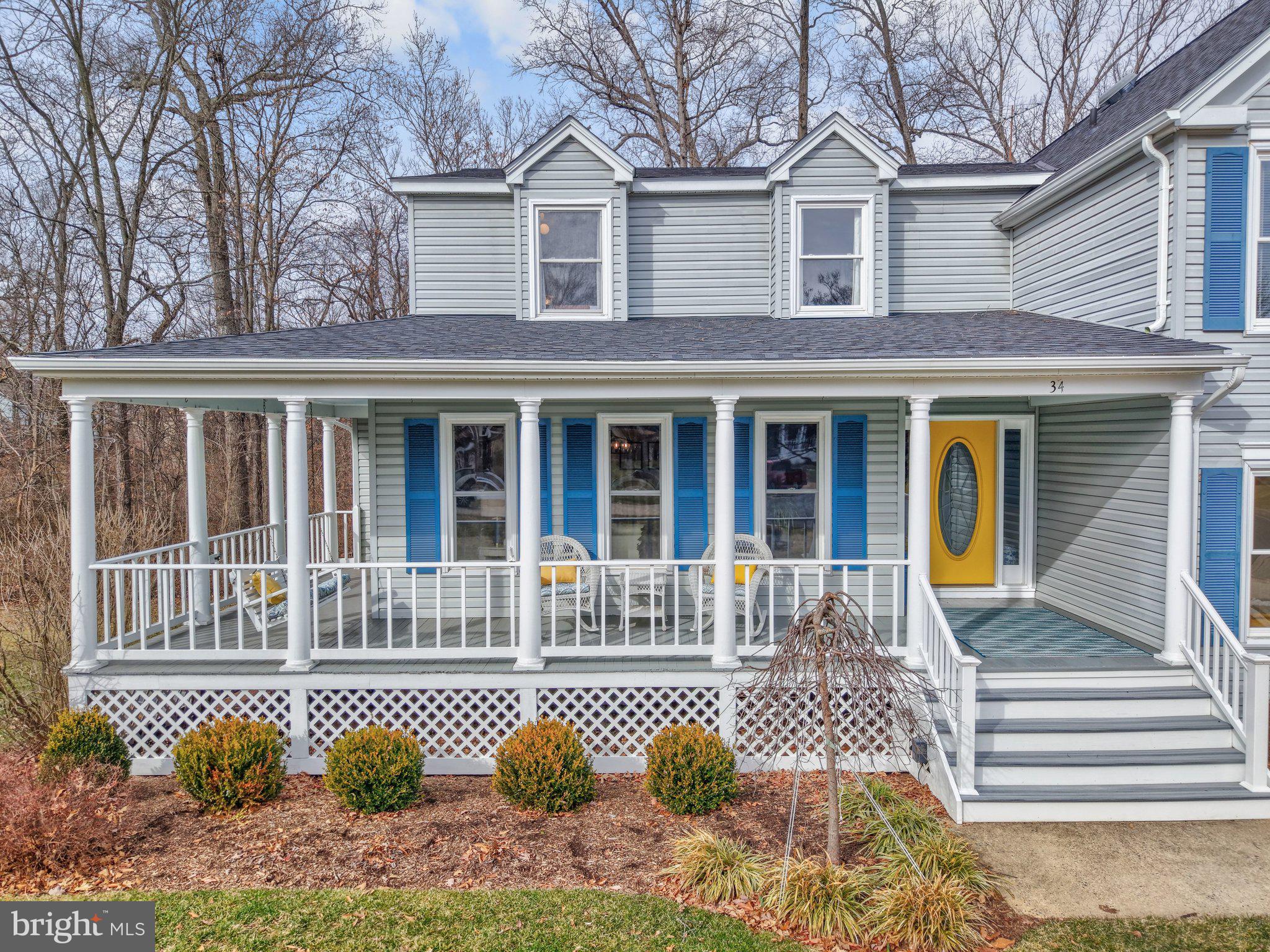 34 Lipscomb Court Sterling, VA 20165 - Photo 5 of 91 a front view of a house with a garden