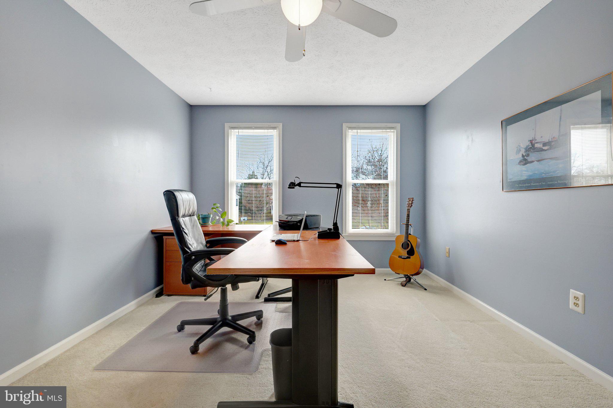 34 Lipscomb Court Sterling, VA 20165 - Photo 55 of 91 a view of a workspace with furniture and a window