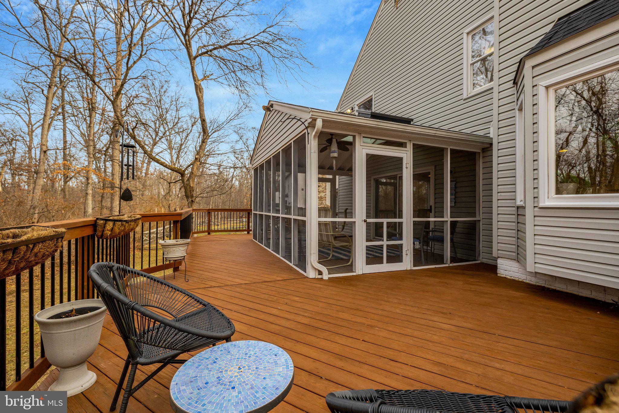 34 Lipscomb Court Sterling, VA 20165 - Photo 64 of 91 a view of a chairs and table in the wooden deck