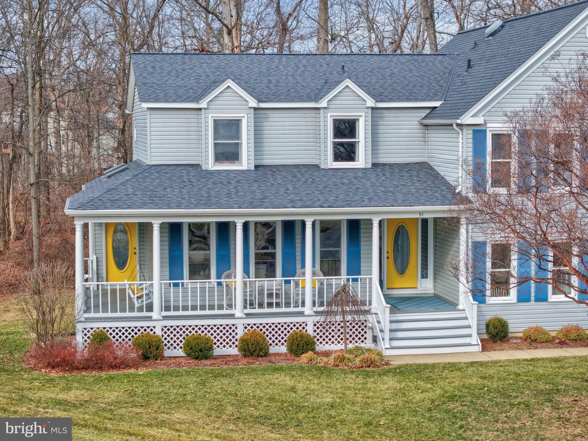 34 Lipscomb Court Sterling, VA 20165 - Photo 84 of 91 a front view of a house with garden