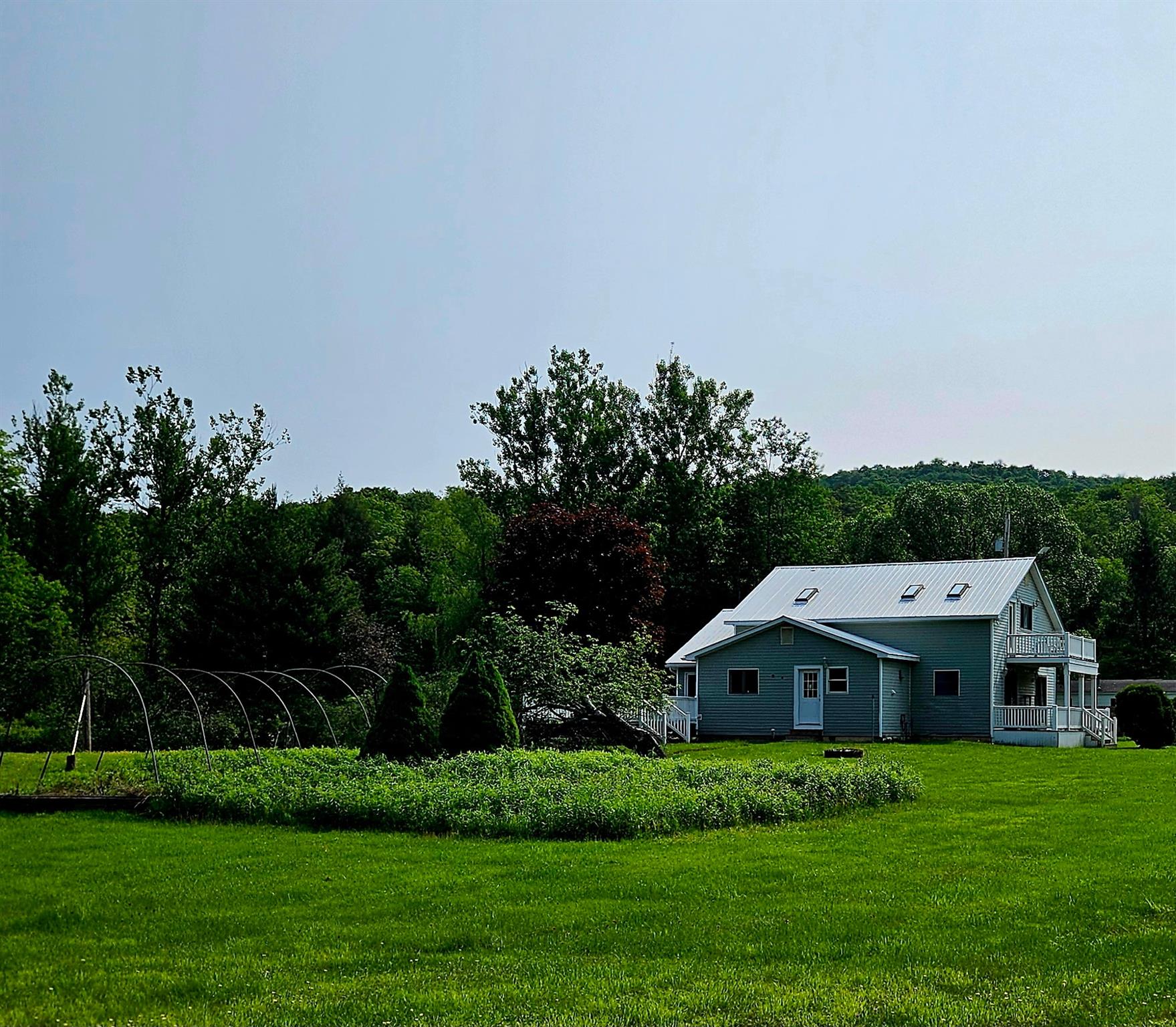 141 Bonnie Brook Road Roscoe, NY 12776 - Photo 15 of 48 View of grassy yard featuring a forest view