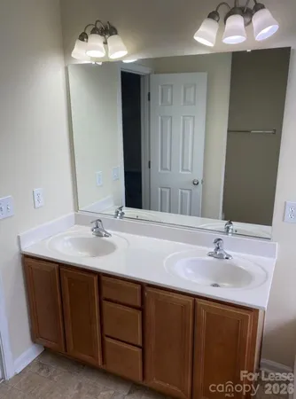 a bath tub sitting next to a window