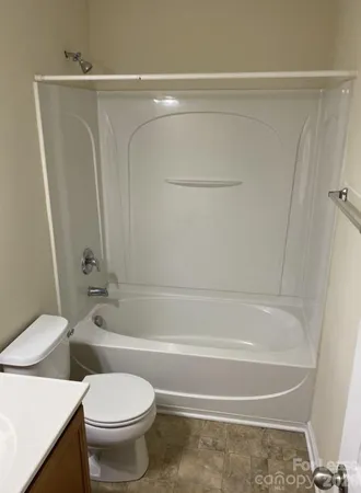 a front view of a house with balcony