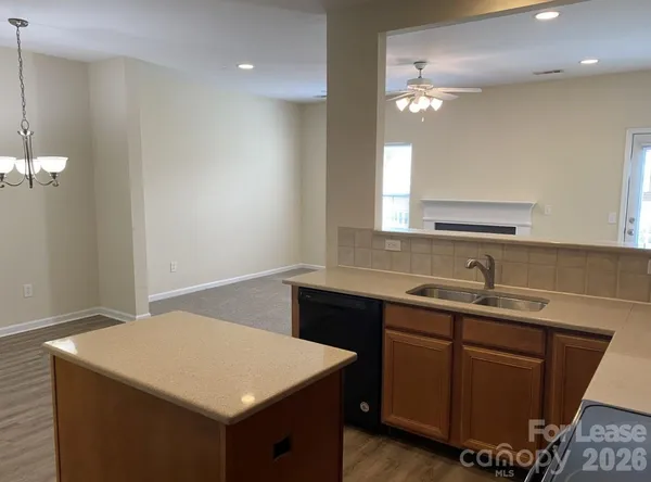 a bathroom with a sink a vanity and a mirror