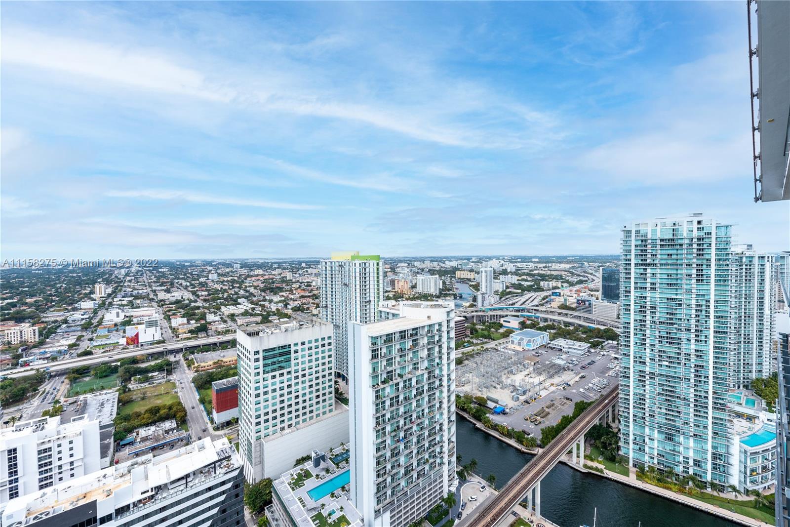 a view of a city with tall buildings