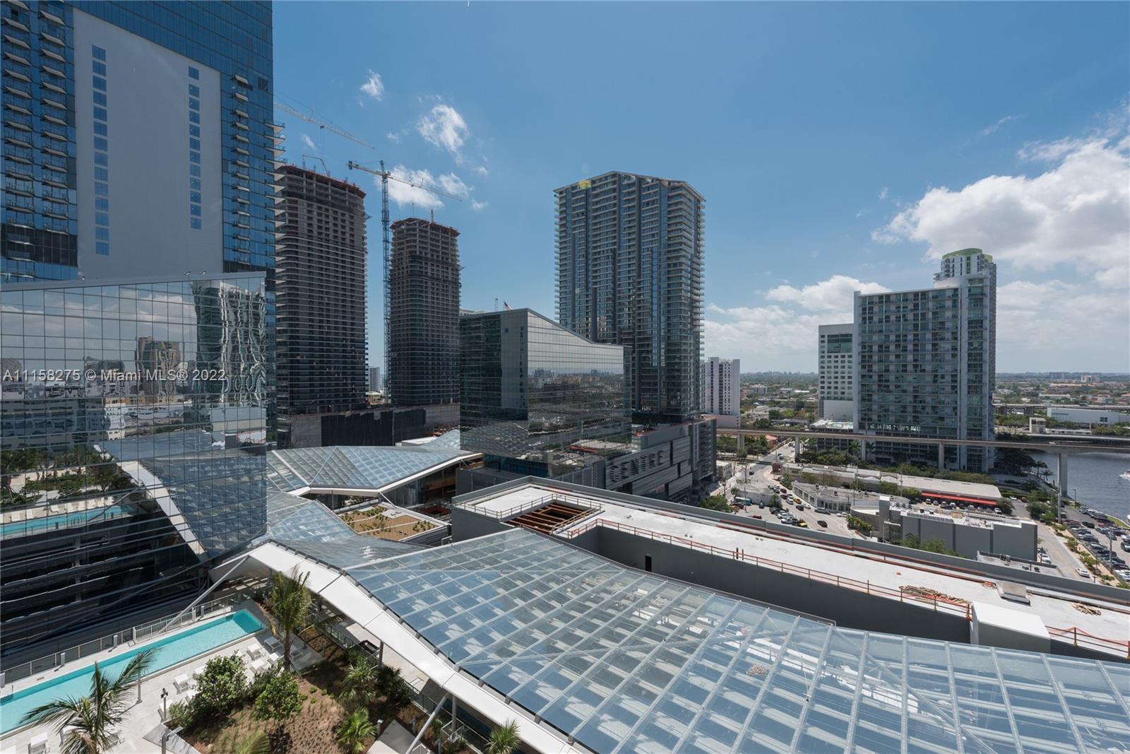 88 Southwest 7th Street, Unit 4110 Miami, FL 33130 - Photo 32 of 33 a living room with furniture and a large window