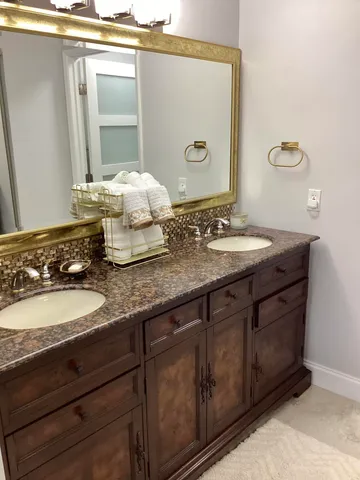 a bathroom with a shower and a toilet