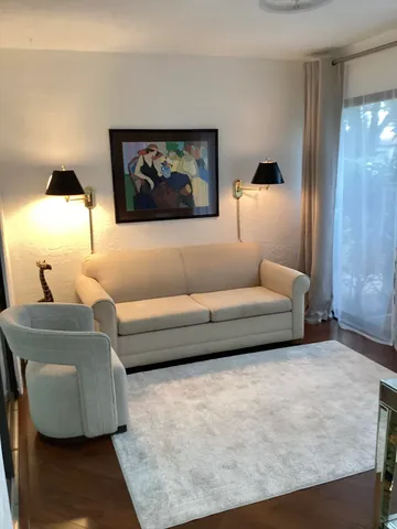 a living room with furniture and a couch