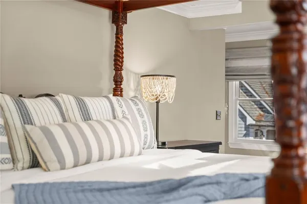 a front view of a house with a yard and porch