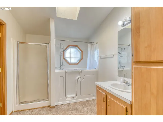 a view of an empty room with windows