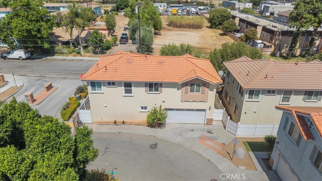 10115 Onyx Way Riverside, CA 92503 - Photo 15 of 18 an aerial view of a house with garden space and street view