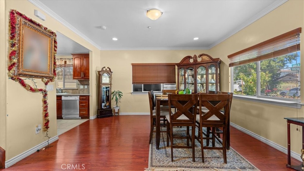 10115 Onyx Way Riverside, CA 92503 - Photo 4 of 18 a view of a dining room with furniture window and wooden floor
