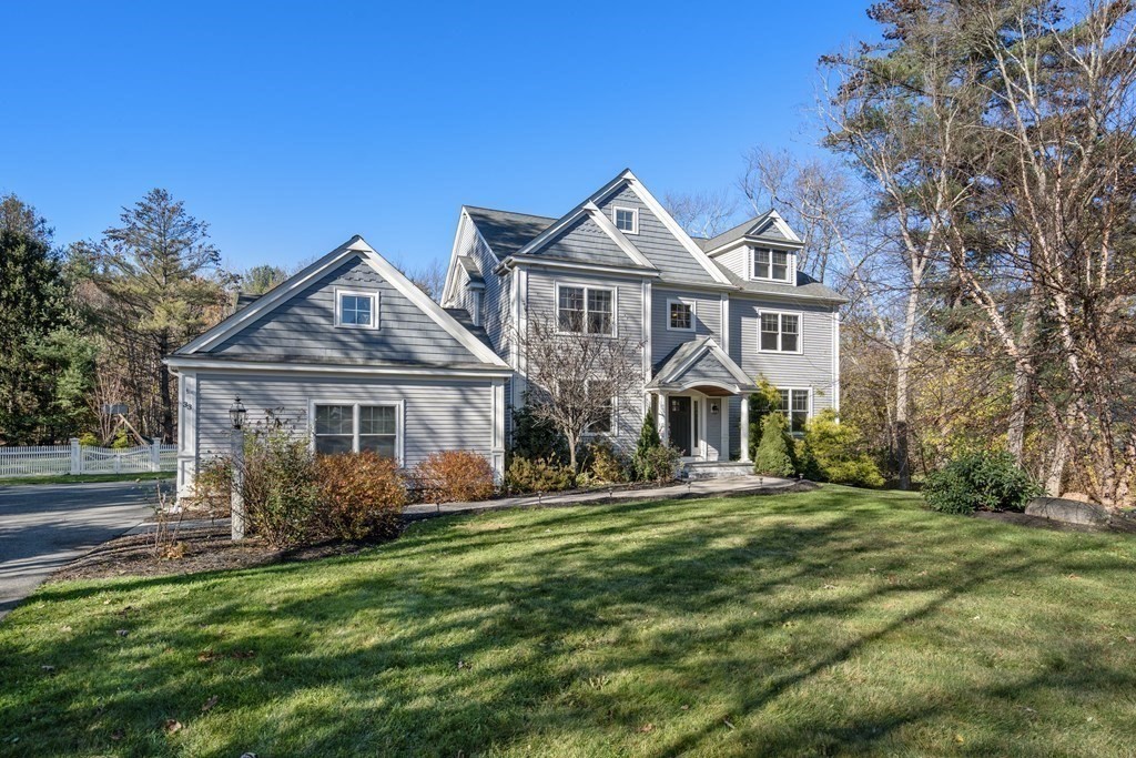 33 Centre Street Dover, MA 02030 - Photo 2 of 32 a front view of a house with garden
