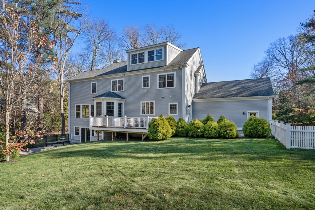 33 Centre Street Dover, MA 02030 - Photo 28 of 32 a front view of a house with garden