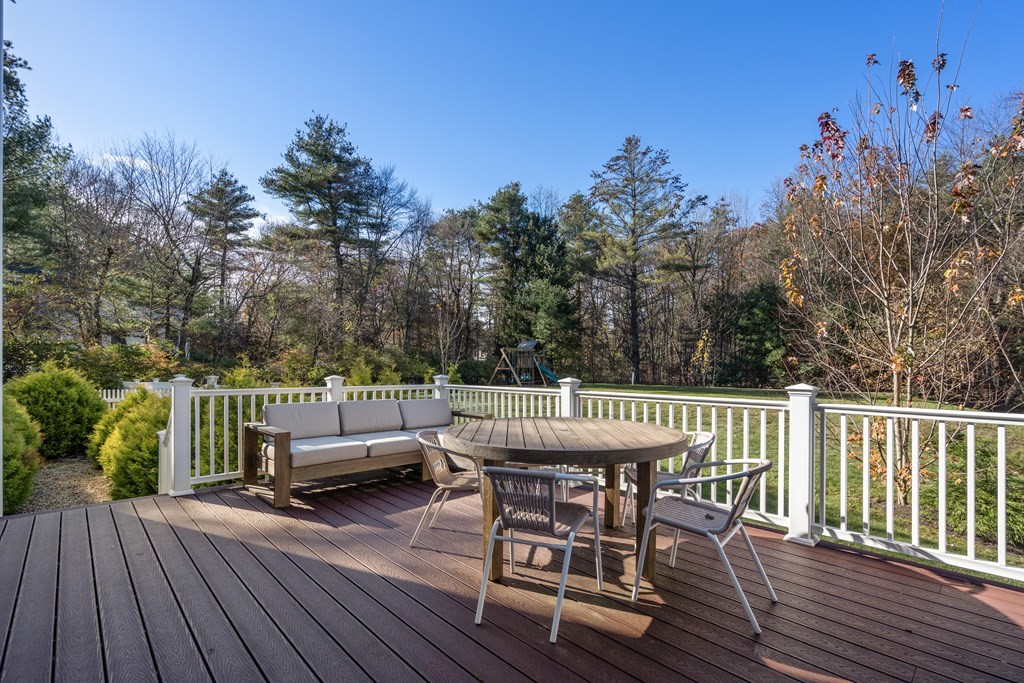 33 Centre Street Dover, MA 02030 - Photo 31 of 32 a view of a chairs and table on the wooden floor