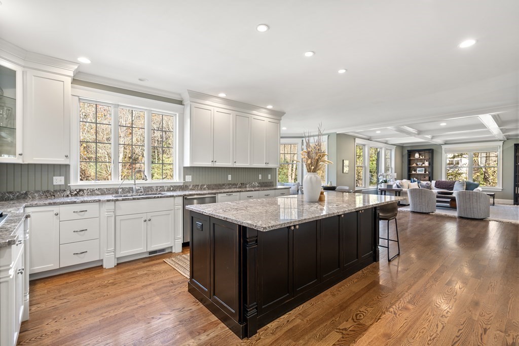 33 Centre Street Dover, MA 02030 - Photo 6 of 32 a open kitchen with granite countertop a sink dishwasher stove and cabinets with wooden floor