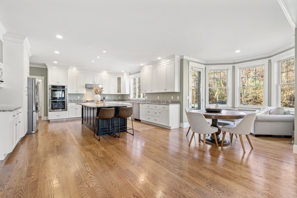 33 Centre Street Dover, MA 02030 - Photo 7 of 32 a living room with furniture and a wooden floor