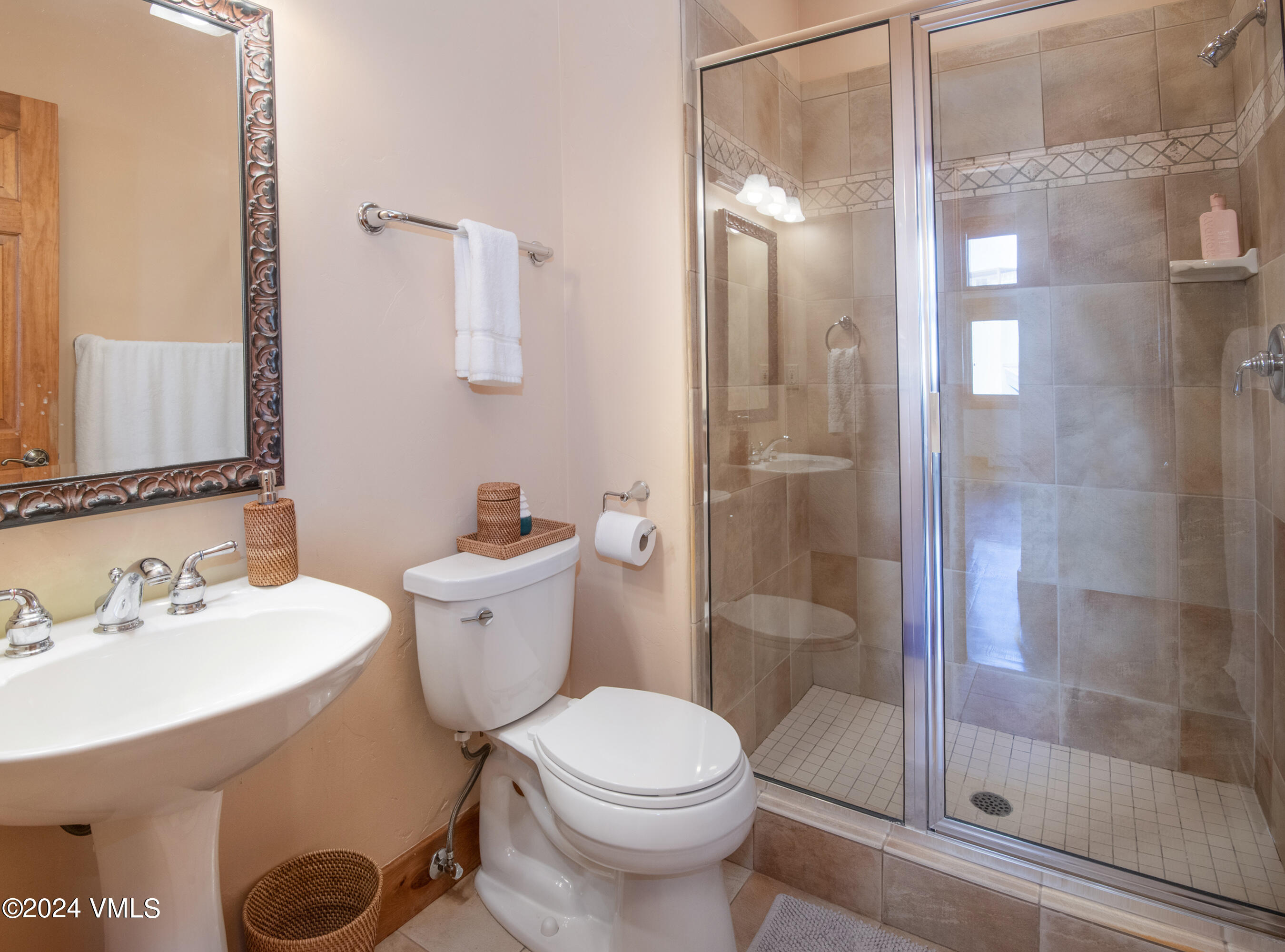 111 Knudson Ranch Road Edwards, CO 81632 - Photo 15 of 31 a bathroom with a sink toilet and shower