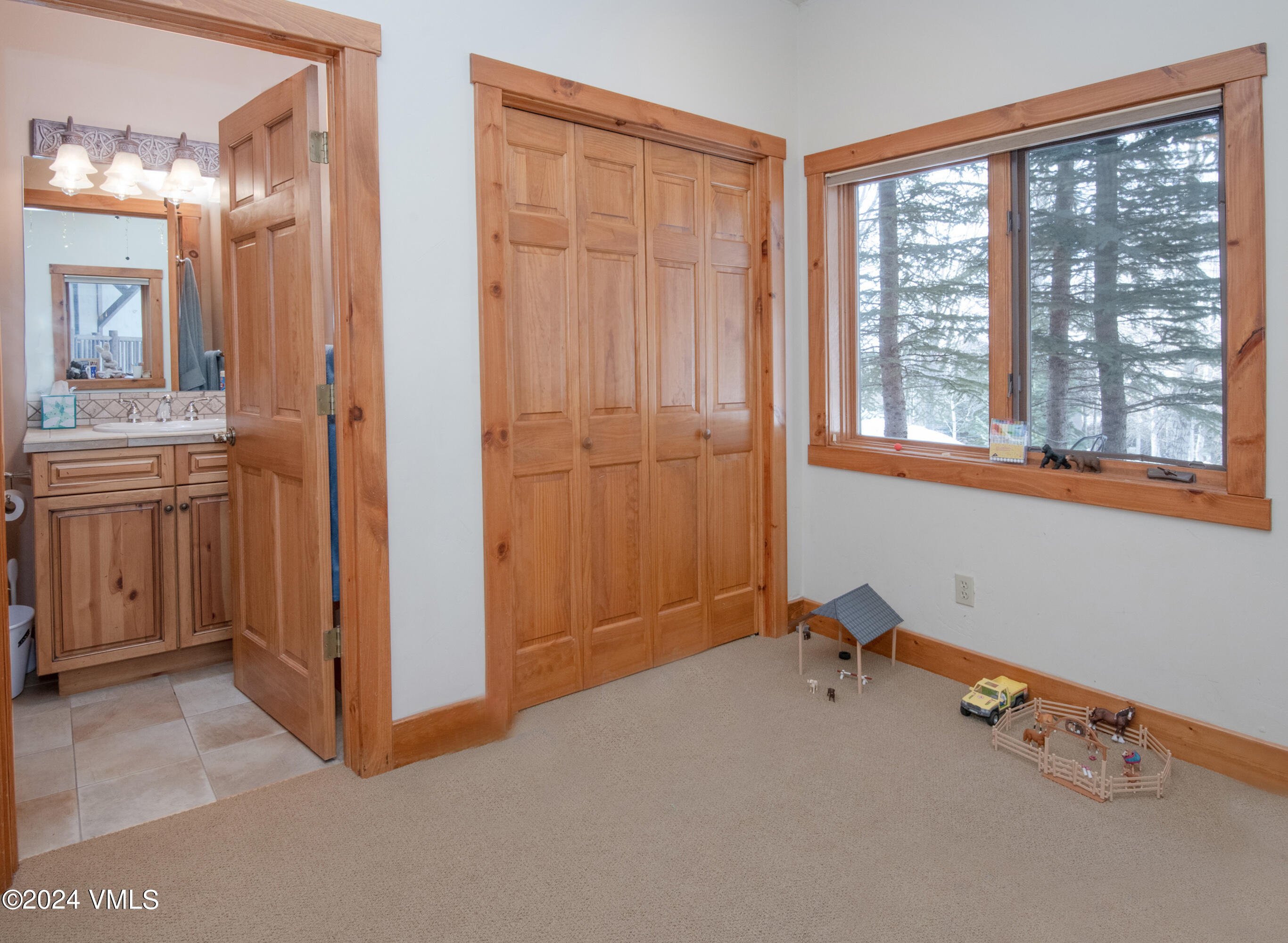 111 Knudson Ranch Road Edwards, CO 81632 - Photo 22 of 31 wooden floor and windows in a room