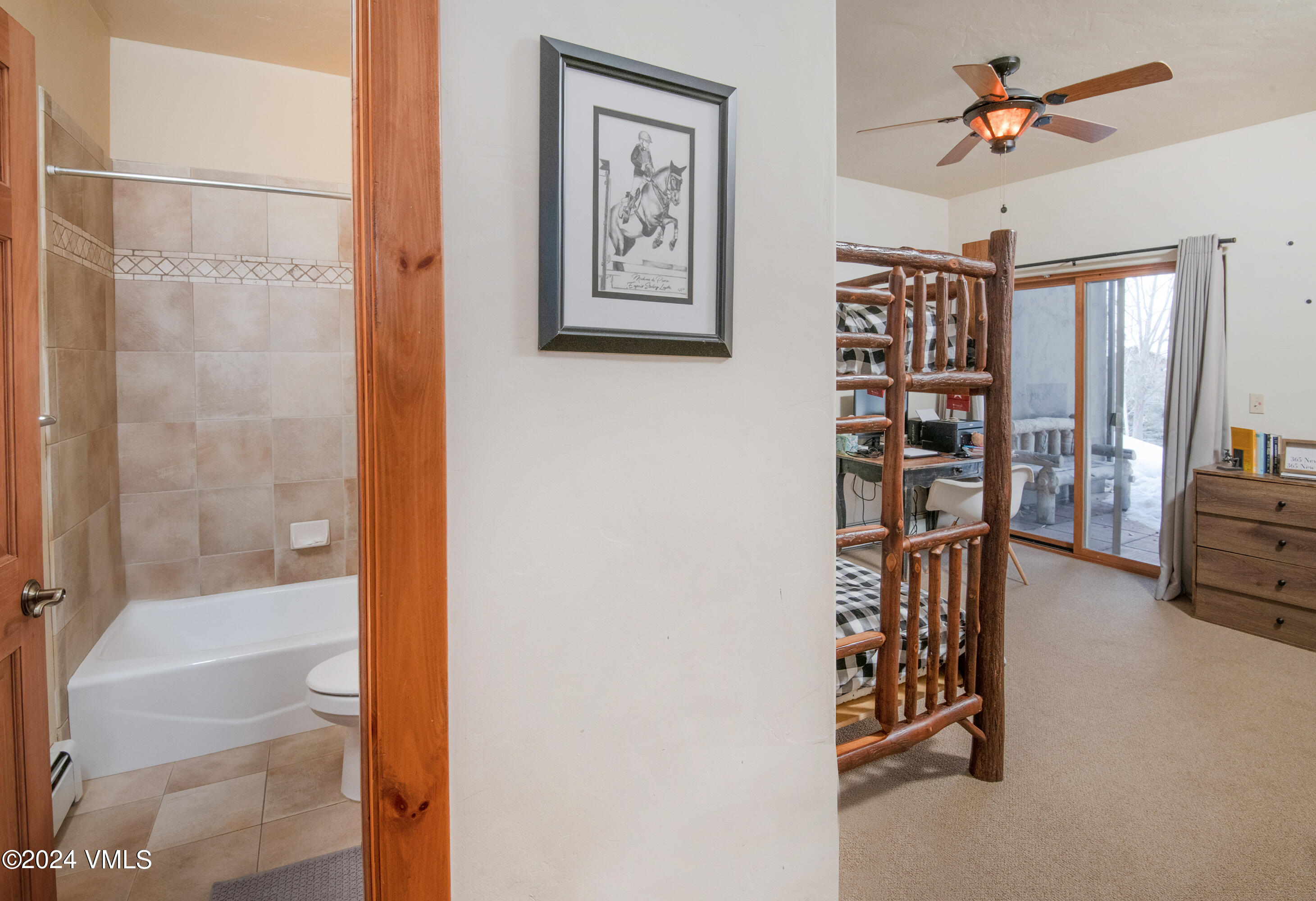 111 Knudson Ranch Road Edwards, CO 81632 - Photo 23 of 31 a view of a livingroom with a bookshelf