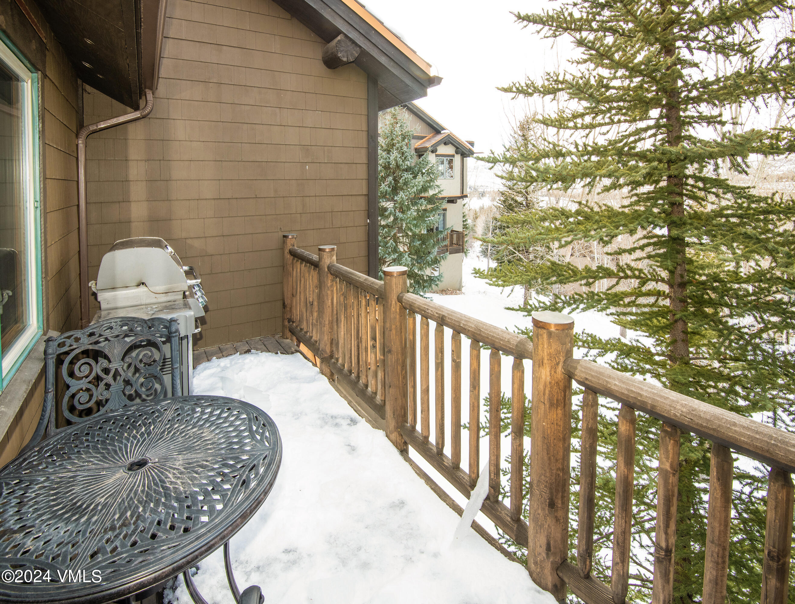 111 Knudson Ranch Road Edwards, CO 81632 - Photo 28 of 31 a view of a porch with a chair