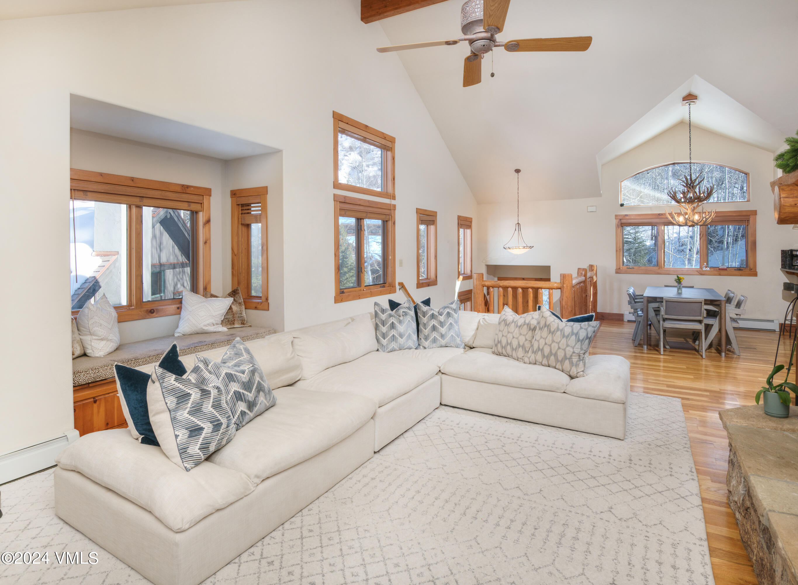 111 Knudson Ranch Road Edwards, CO 81632 - Photo 3 of 31 a living room with furniture and a large window