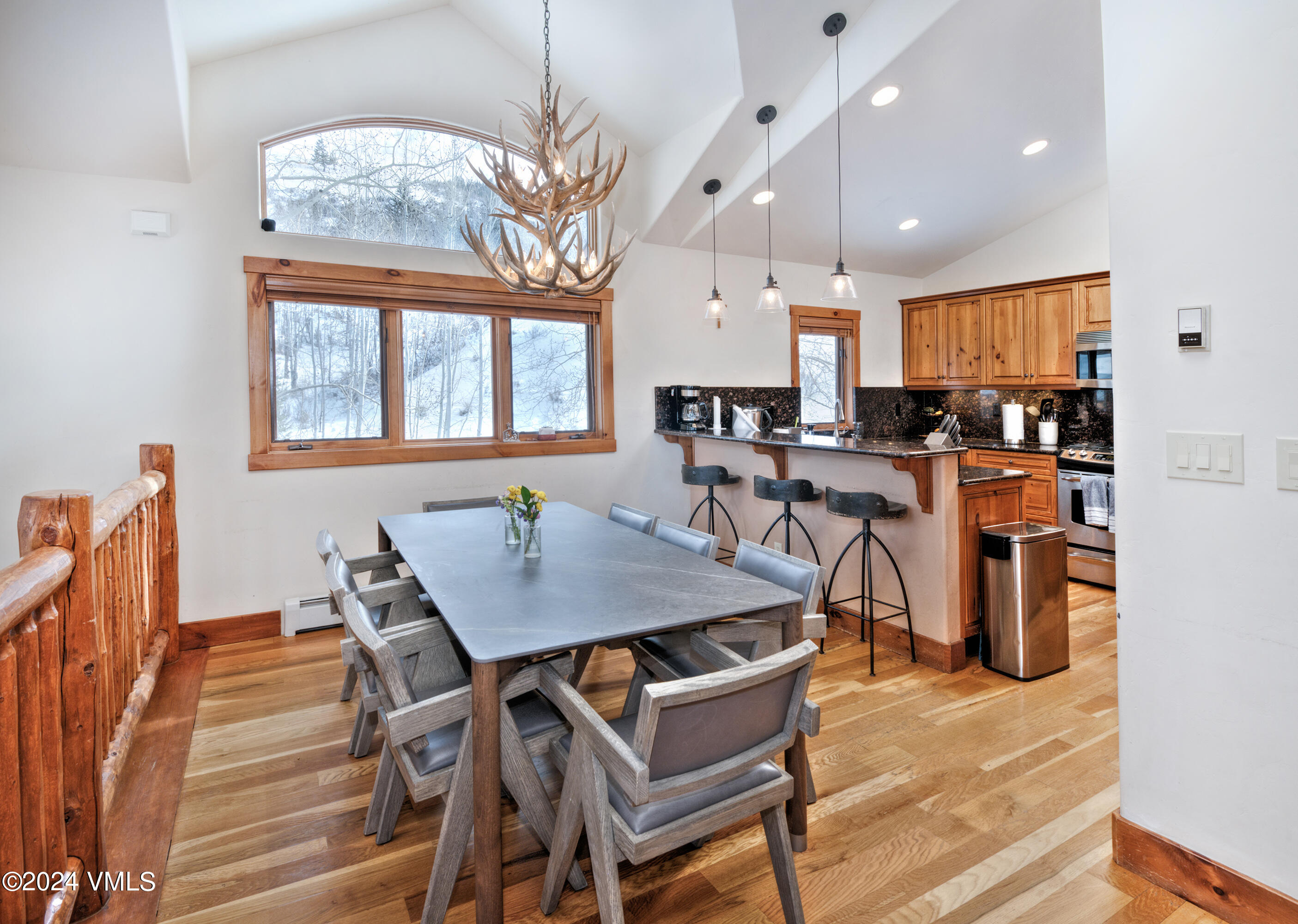111 Knudson Ranch Road Edwards, CO 81632 - Photo 9 of 31 a view of a a dining room with furniture window and wooden floor