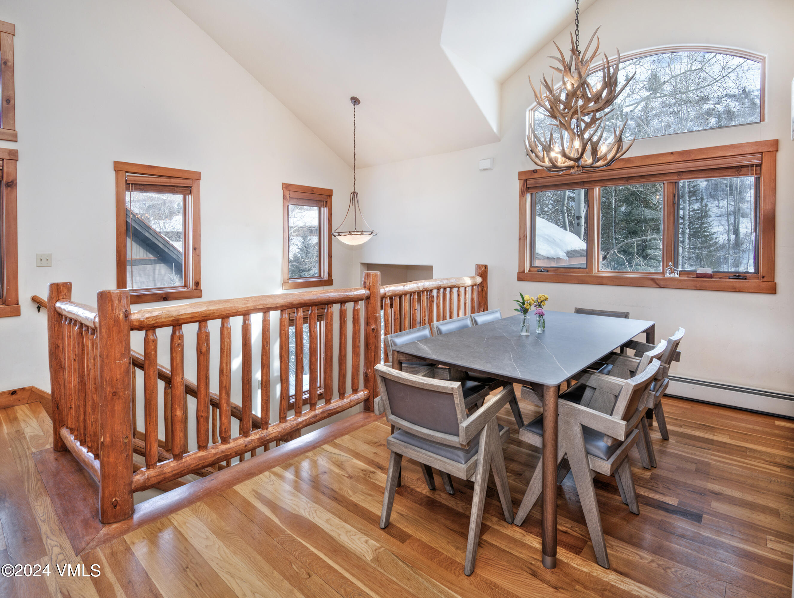 111 Knudson Ranch Road Edwards, CO 81632 - Photo 10 of 31 a view of a dining room with furniture window and wooden floor