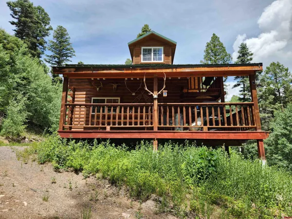 a view of a house with roof deck