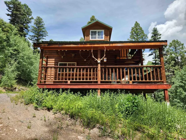 a view of a house with roof deck