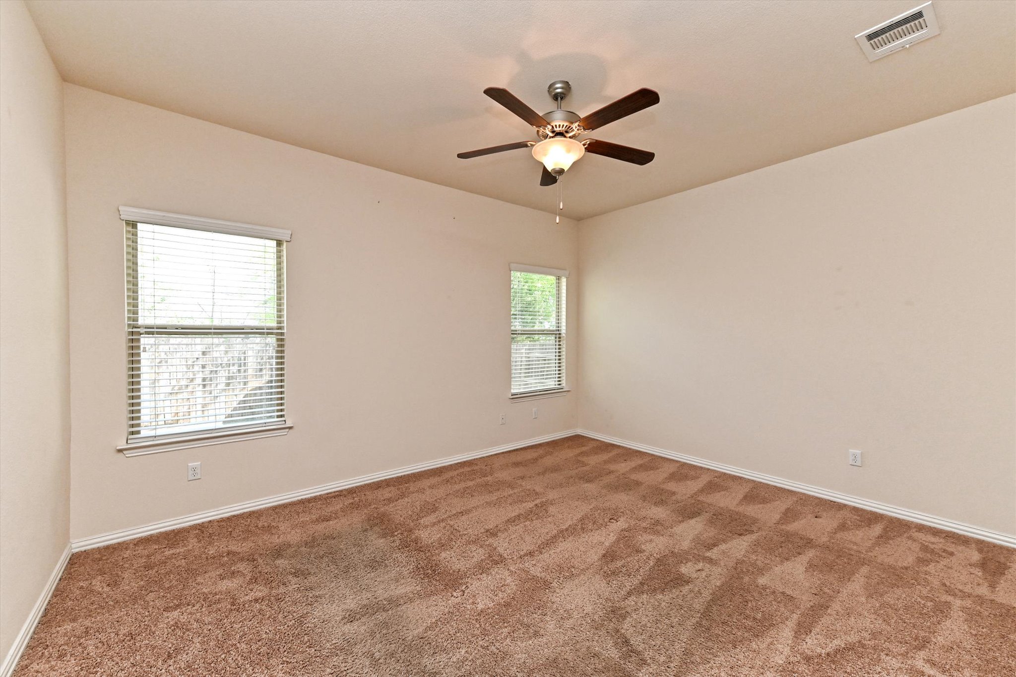 265 Shale Circle Buda, TX 78610 - Photo 17 of 29 Spare room with carpet and ceiling fan