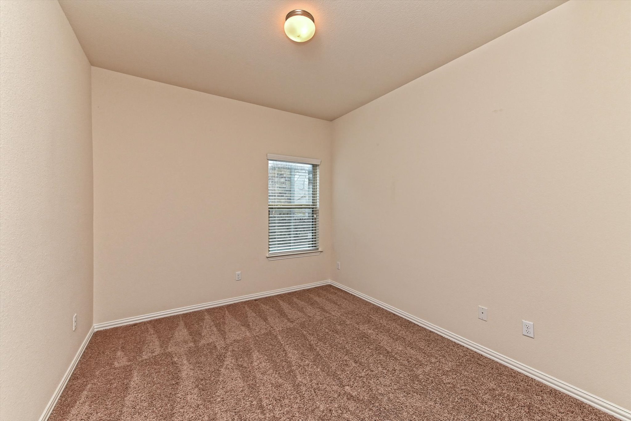 265 Shale Circle Buda, TX 78610 - Photo 21 of 29 Unfurnished room with carpet floors and baseboards